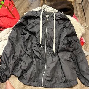 Old navy, wind/rain jacket, with headphones and connector to phone